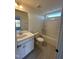 Clean bathroom with a bathtub, toilet and vanity at 23 Quail Pt Cir, Clayton, NC 27520