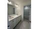 Double vanity bathroom with a shower and bathtub at 23 Quail Pt Cir, Clayton, NC 27520