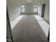 Large bedroom with carpet and windows offering natural light at 23 Quail Pt Cir, Clayton, NC 27520