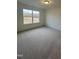 Bright bedroom with carpet and a large window overlooking the landscape at 23 Quail Pt Cir, Clayton, NC 27520