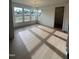 Bright dining room with hardwood floors and large windows at 23 Quail Pt Cir, Clayton, NC 27520