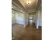 Bright and spacious foyer with hardwood floors and wainscoting at 23 Quail Pt Cir, Clayton, NC 27520