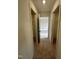 Spacious hallway with two closets and carpet flooring at 23 Quail Pt Cir, Clayton, NC 27520
