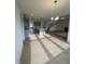 Open concept kitchen with island and view of living room at 23 Quail Pt Cir, Clayton, NC 27520