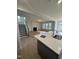 Open living room with fireplace and hardwood floors at 23 Quail Pt Cir, Clayton, NC 27520