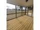 Relaxing screened porch overlooking backyard at 23 Quail Pt Cir, Clayton, NC 27520