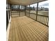 Spacious screened porch with wood decking at 23 Quail Pt Cir, Clayton, NC 27520
