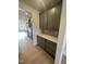 Walk-in pantry with ample shelving for food storage at 23 Quail Pt Cir, Clayton, NC 27520