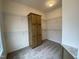 Large walk-in closet with shelving and built-in cabinet at 6733 Oscar Barham Rd, Wake Forest, NC 27587