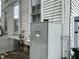 Rear exterior view showing HVAC unit and electrical panel at 414 E Morehead St, Burlington, NC 27215