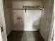 Small laundry room with shelving and hookups at 414 E Morehead St, Burlington, NC 27215