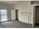Spacious bedroom with fireplace, closet, and window at 414 E Morehead St, Burlington, NC 27215