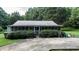 Small cottage with screened porch and patio at 118 Dailwill Dr, Clayton, NC 27520