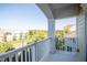 Private balcony offering views of the surrounding neighborhood at 10420 Sablewood Dr # 115, Raleigh, NC 27617