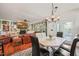 Bright dining room with hardwood floors and access to the back patio at 12217 Beestone Ln, Raleigh, NC 27614