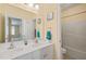 Double vanity bathroom with a shower/tub combo at 12217 Beestone Ln, Raleigh, NC 27614