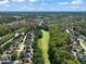 Community overview showcasing homes near a golf course at 12217 Beestone Ln, Raleigh, NC 27614