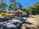 Newly built house with a red front door and concrete driveway at 910 West St, Smithfield, NC 27577