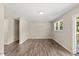 Bright dining room with hardwood floors and large windows at 712 Blount St, Smithfield, NC 27577
