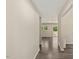 Hallway view into living area with wood floors at 712 Blount St, Smithfield, NC 27577