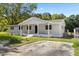 Newly renovated home with driveway and green lawn at 712 Blount St, Smithfield, NC 27577
