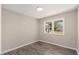 Bright bedroom with wood-look floors and a window at 712 Blount St, Smithfield, NC 27577