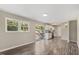 Open concept dining area with hardwood floors and deck access at 712 Blount St, Smithfield, NC 27577