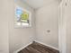 Laundry room with vinyl flooring and built-in storage at 712 Blount St, Smithfield, NC 27577
