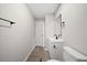 Updated bathroom with gray vanity, modern fixtures, and a shower at 712 Blount St, Smithfield, NC 27577