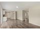 Open dining area with hardwood floors and kitchen views at 712 Blount St, Smithfield, NC 27577