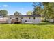 Backyard view of house with deck and propane tank at 712 Blount St, Smithfield, NC 27577