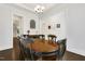 Dining room with an oval table and kitchen view at 562 Legacy Falls S Dr, Chapel Hill, NC 27517