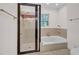 Bathroom with shower and bathtub at 23 Chancery Pl, Durham, NC 27707