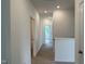 Linen closet and two bedrooms are accessible from this hallway at 87 Furley St., Homesite 112, Sanford, NC 27330