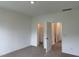 Bright bedroom with access to bathroom and closet at 87 Furley St., Homesite 112, Sanford, NC 27330