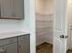 Walk-in pantry with wire shelving, offering ample storage space at 87 Furley St., Homesite 112, Sanford, NC 27330