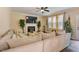 Relaxing living room with sectional sofa, fireplace, and hardwood floors at 65 Applegate Dr, Franklinton, NC 27525