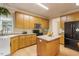 Well-equipped kitchen with island, ample storage, and stainless steel appliances at 65 Applegate Dr, Franklinton, NC 27525