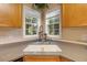 Modern corner sink with a stylish faucet and ample counter space at 65 Applegate Dr, Franklinton, NC 27525