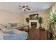 Comfortable living room with sectional sofa and a gas fireplace at 65 Applegate Dr, Franklinton, NC 27525