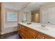 Bathroom with double vanity, soaking tub, and separate shower at 65 Applegate Dr, Franklinton, NC 27525