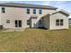 Home's backyard with a patio and grassy area at 9 Oxmoor Dr, Durham, NC 27703