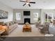 Virtually staged living room with fireplace and access to backyard at 9 Oxmoor Dr, Durham, NC 27703