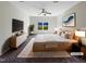 Virtually staged main bedroom with large window and plush carpet at 9 Oxmoor Dr, Durham, NC 27703