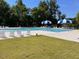 Relaxing community pool with plenty of lounge chairs at 167 Pretty Run Branch Ln, Wendell, NC 27591