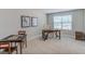 Bright bedroom with desk and game table at 167 Pretty Run Branch Ln, Wendell, NC 27591
