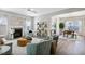 Open living room featuring a fireplace and a view into the dining area at 167 Pretty Run Branch Ln, Wendell, NC 27591