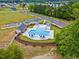 Aerial view showing community pool and surrounding homes at 167 Pretty Run Branch Ln, Wendell, NC 27591