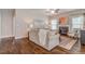 Living room with cozy seating and hardwood floors at 167 Pretty Run Branch Ln, Wendell, NC 27591