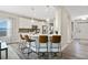 Modern kitchen with white cabinets, quartz countertops, and an island at 167 Pretty Run Branch Ln, Wendell, NC 27591
